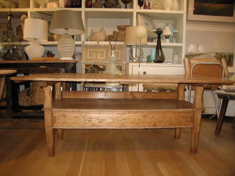 a beautiful metamorphic English pine table that converts to a bench

exceptional patina