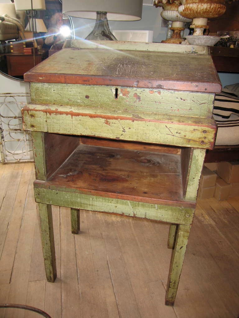 very primitive lift top desk from a school in old green paint