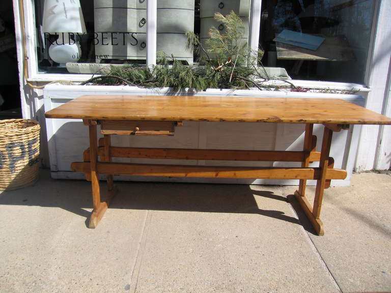 a rustic Italian table, top lifts off, one drawer