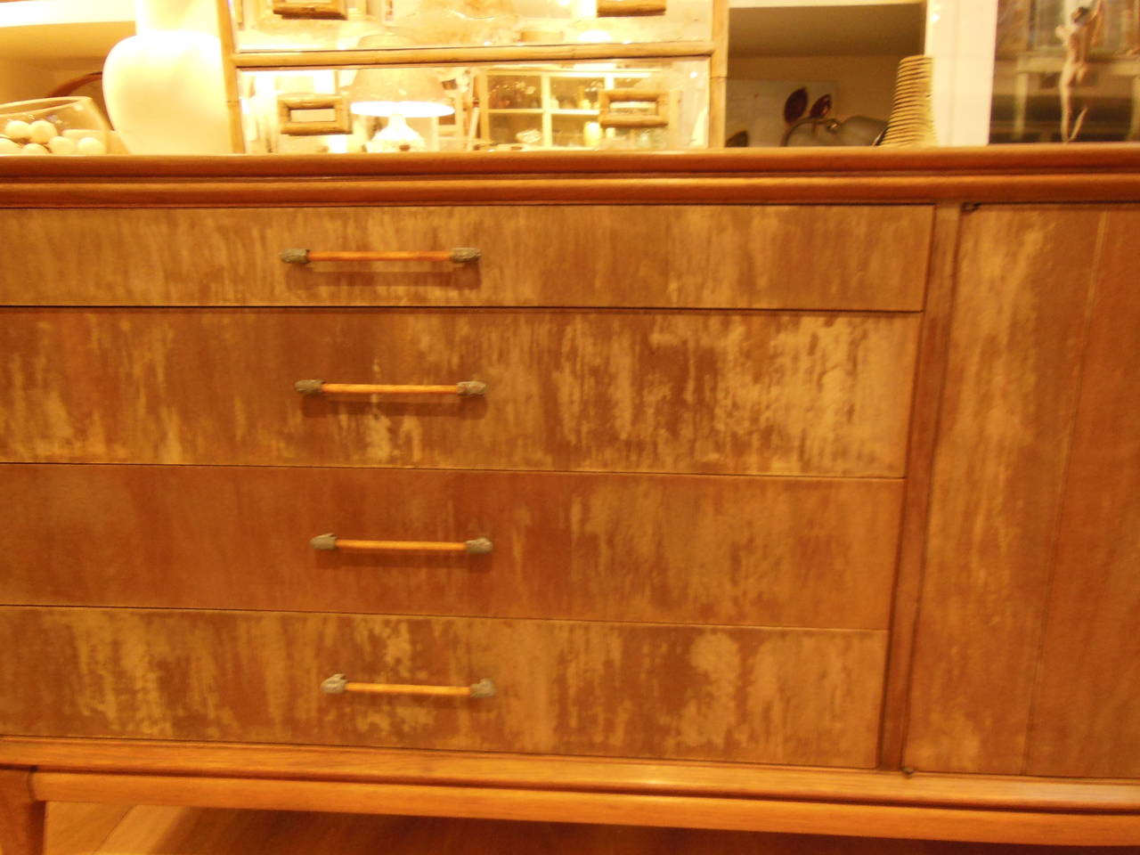 handsome cabinet with ample storage and a distressed cerrused finish