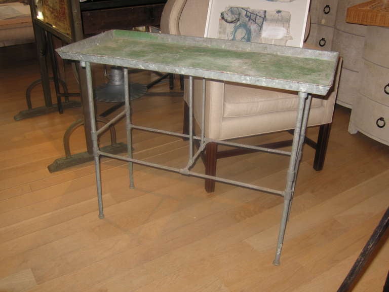 a vintage 1920s zinc potting table with great patina and tray top