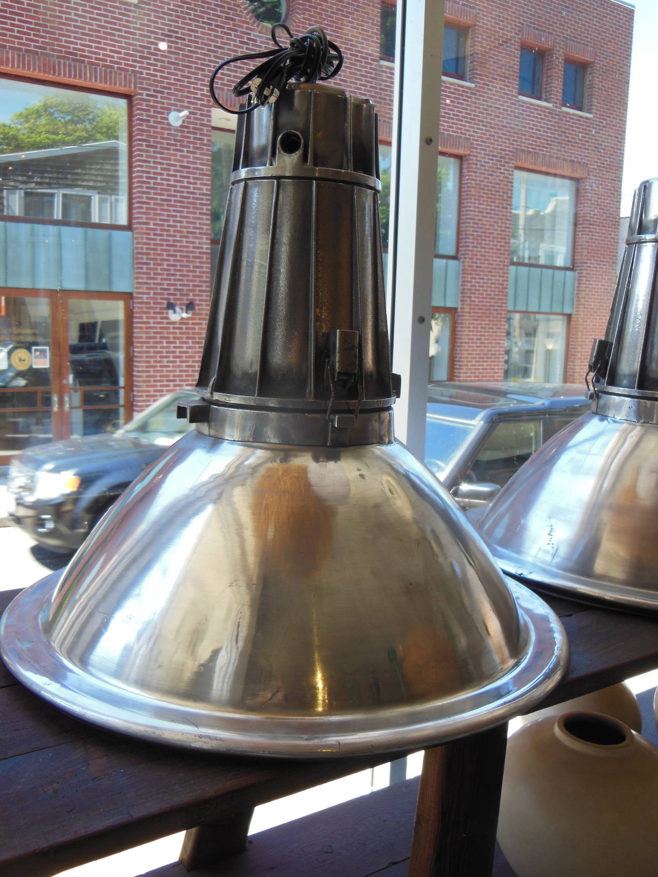a fantastic pair of huge industrial aluminum lights rewired with diffusers