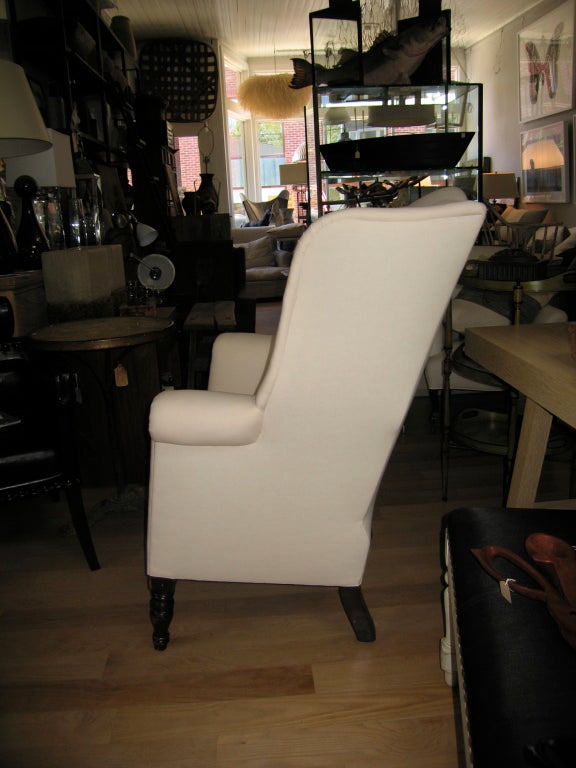very nice wing chair newly reupholstered in muslin