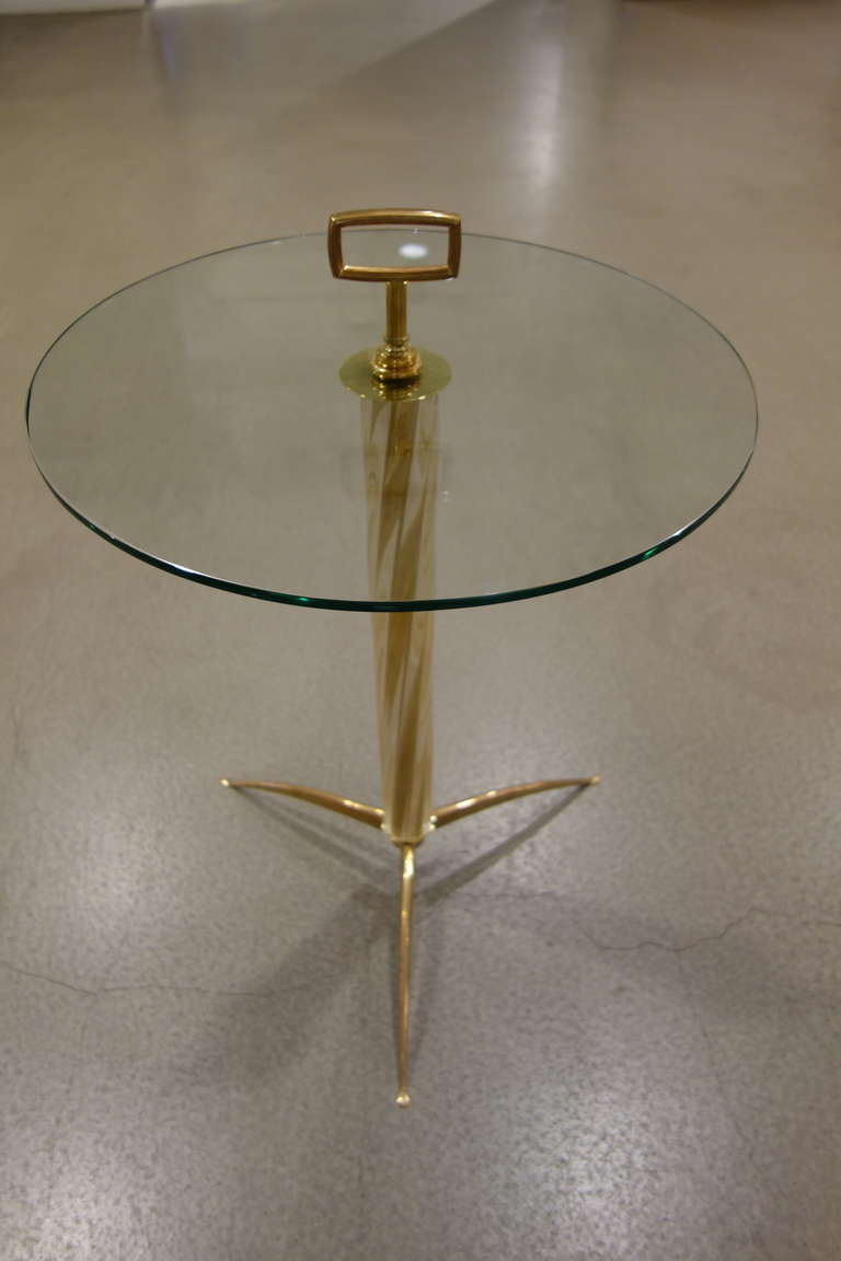 Single Mid-Century Italian side/end table with clear glass circular top pierced by 4.25