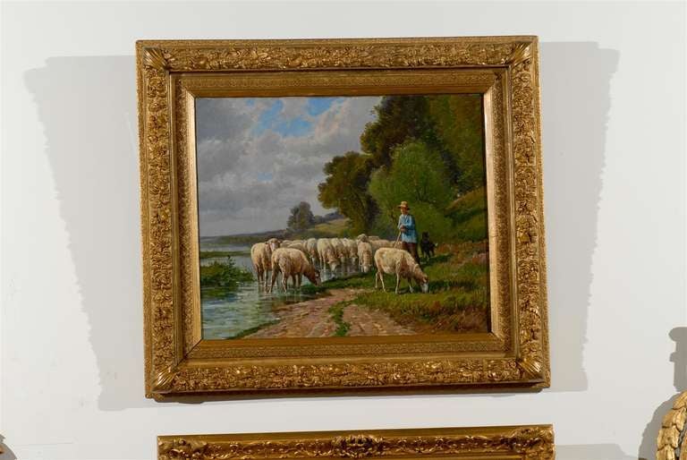 Tableau de l'école française de Barbizon représentant un troupeau de moutons avec un berger et un chien par l'artiste français Pablo Martinez Del Rio, datant de la fin du XIXe siècle, dans un cadre en bois doré. Cette peinture de plein air de