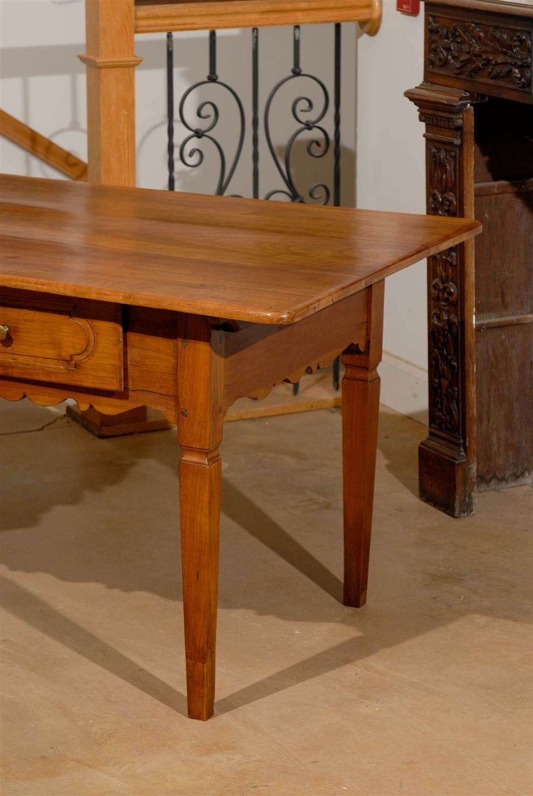 French 1890s Fruitwood Two-Drawer Table with Scalloped Apron and Tapered Legs 2