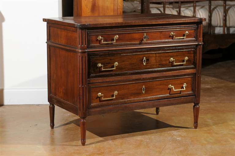 French Louis XVI Style, Walnut, Commode-Three Drawers- Circa 1820. Please Note This Item is an Antique and is One of a Kind.