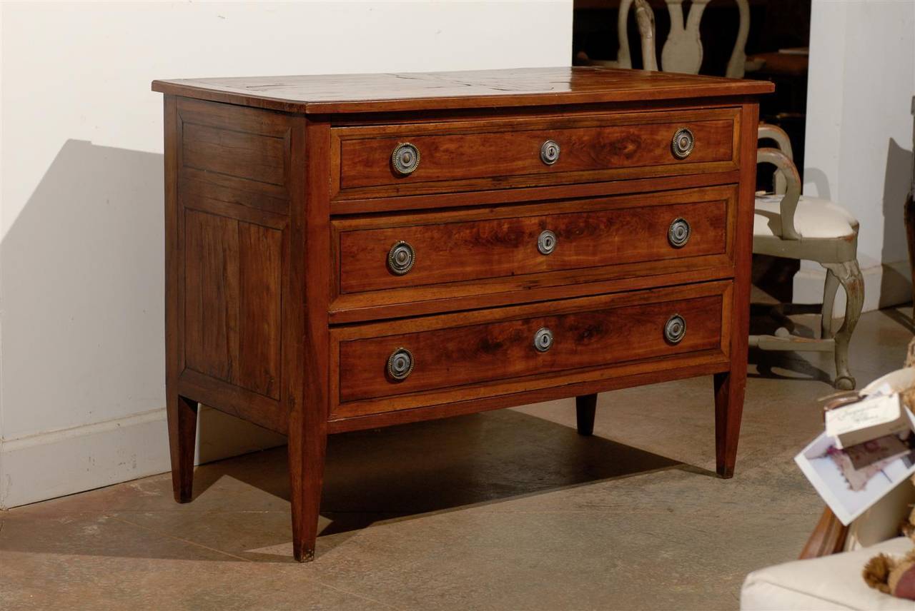 French 18th century inlay commode with three drawers and light banding.
