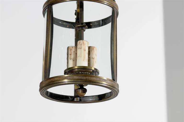 French Louis XVI Style Bronze Three-Light Lantern with Glass Panels and Finials In Good Condition In Atlanta, GA