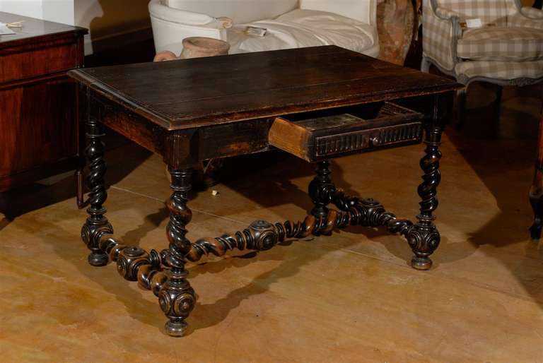 A period Louis XIII French walnut side table with single drawer and barley-twist legs from the mid-17th century. Born at the end of the reign of King Louis XIII, father of the Sun King, this exquisite French walnut table features a rectangular top