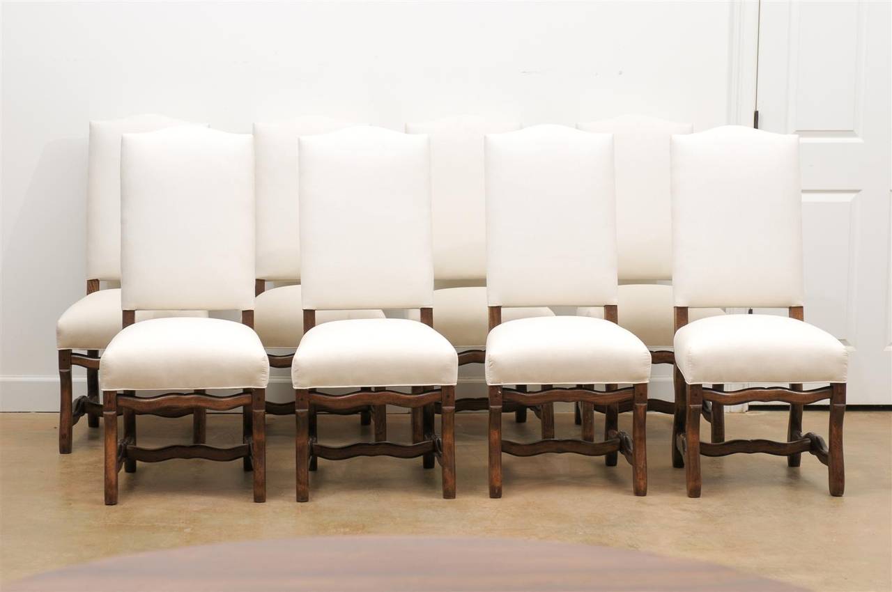 Set of French 19th century Os de Mouton dining chairs with new cotton upholstery.