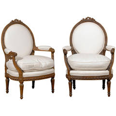 Pair of French Louis XVI Style Upholstered Armchairs from the Early 19th Century