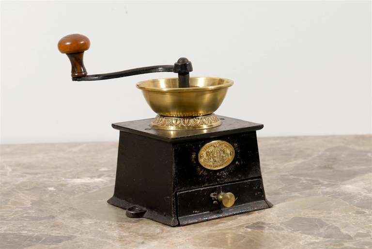 Iron and Brass Coffee Grinder Made by Kenrick and Sons- Has Royal Crest. Note This Item is an Antique and is One of a Kind. Please Refer to Our Website for Our Complete Inventory-jadamsantiques.com