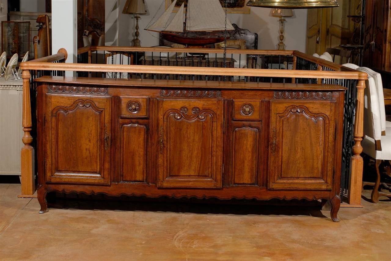 French 18th Century Walnut Enfilade with Three Doors and Two Drawers. Simply Carved with Beautiful Lines.