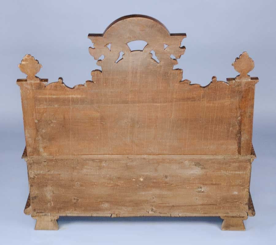 Beautiful Walnut Italian heavily carved 'Settle' (Deacons' bench). Lion head arms. Stylised Gryphons on Pediment. Female figurine depicted in center back rest. Seat lifts for storage.