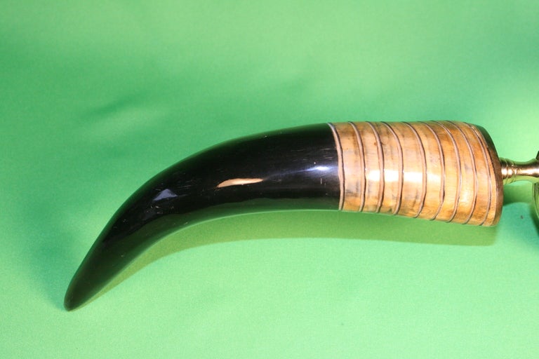 Hurge Horn & Antler magnifying glass with brass surround. Black rubber inlay surrounding glass.  