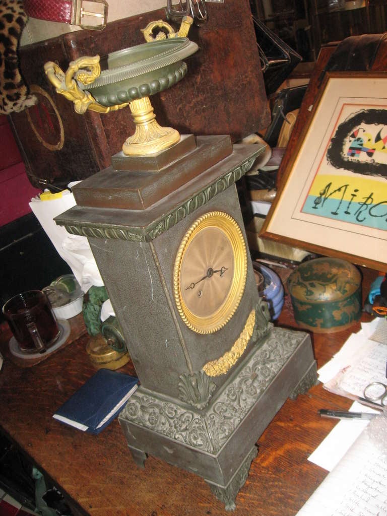 French 19th Century, Iron and Bronze Clock