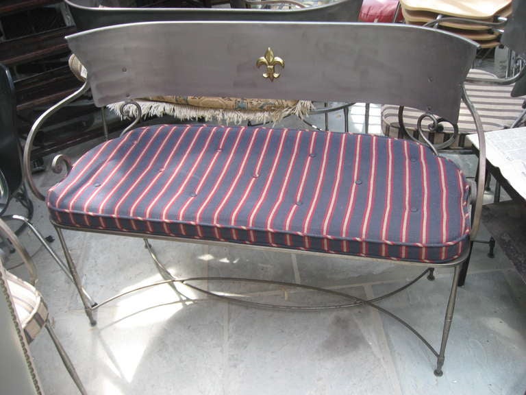 Italian brushed steel loveseats with brass fleur-de-lis- upholster handmade seat.
Three available.
With cushion.
19