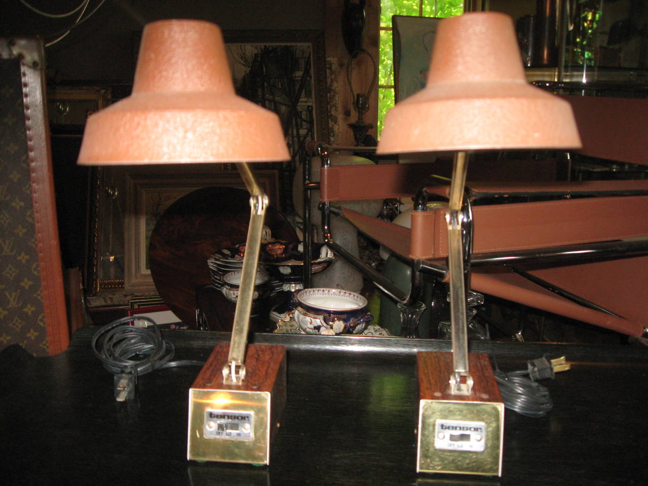 Pair of Mid-Century adjustable task table/desk lamps by Tensor. Works and
has bulbs.