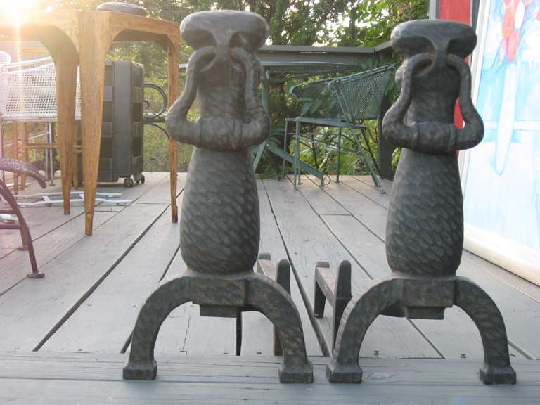 Pair of American Arts and Crafts hammered iron andirons with knockers.