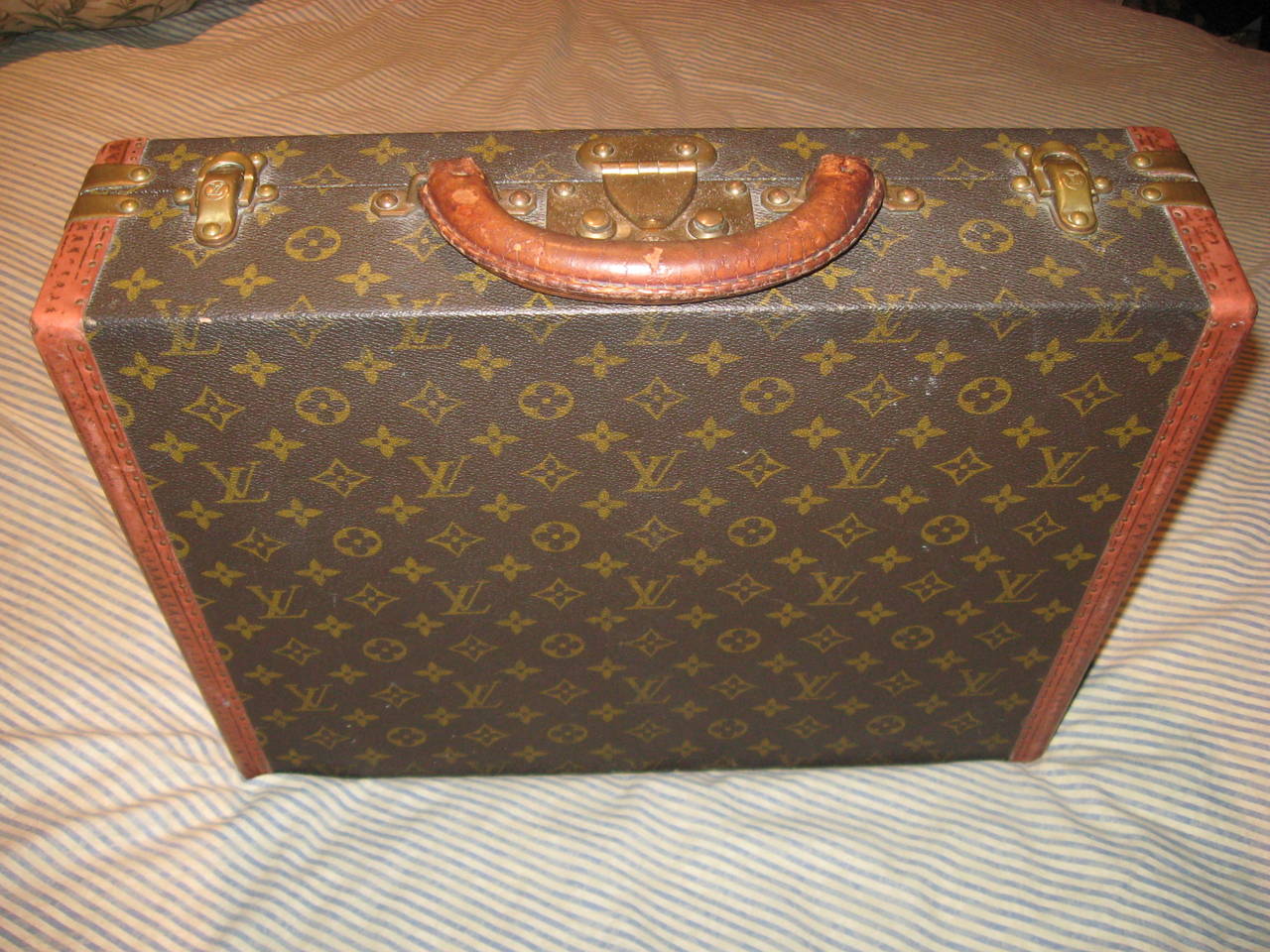 Louis Vuitton vintage briefcase with key.