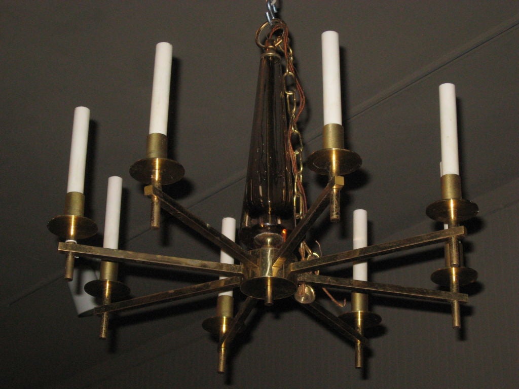 Midcentury eight-light brass and crystal chandelier by Orrefors.