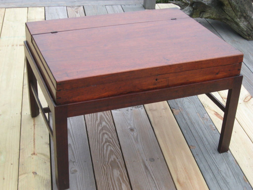 19th century mohogany document box on a later stand table with great patina.