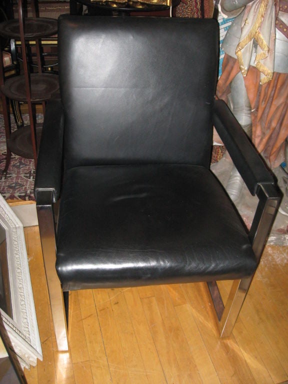 Very heavy leather and chrome armchair by Ralph Lauren. Seat D 19.5.