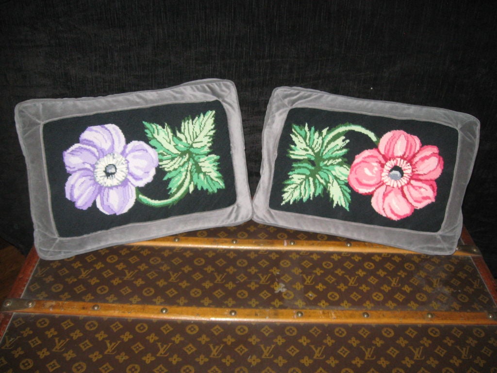 Pair of original design handmade needlepoint down pillows of spring flowers with grey velvet background.