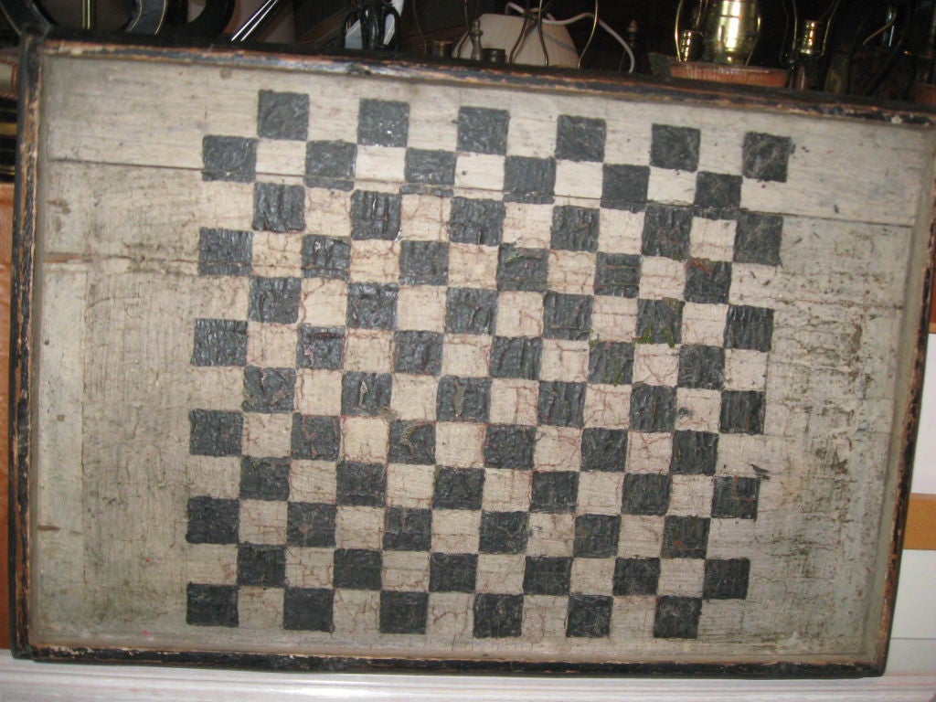 American 19th century hand-painted two-sided game board in grey and black.
