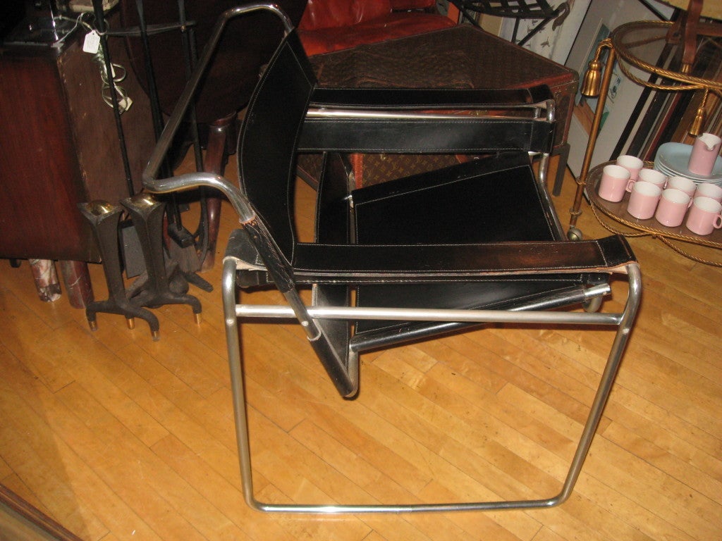 Pair of vintage Marcel Breuer wassily chairs in black leather.