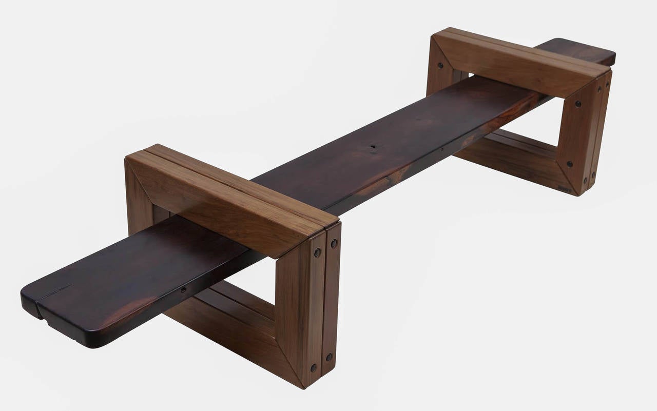Simple and luxurious, the jacaranda bench uses a rare and beautiful reclaimed plank of jacaranda wood (Brazilian rosewood) for its seat, with very minimal interventions. This is a unique piece.