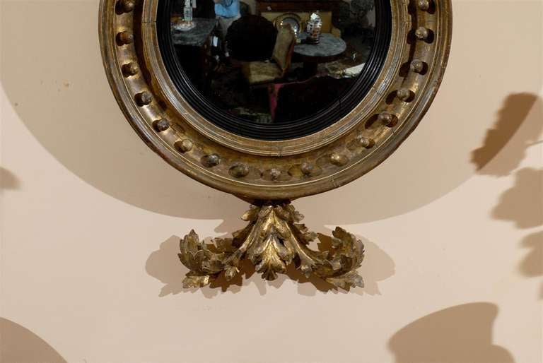 A Fine Early 19th Century English Bull's Eye Mirror with Eagle Crest 1