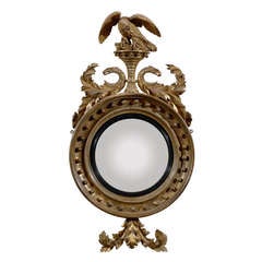 A Fine Early 19th Century English Bull's Eye Mirror with Eagle Crest