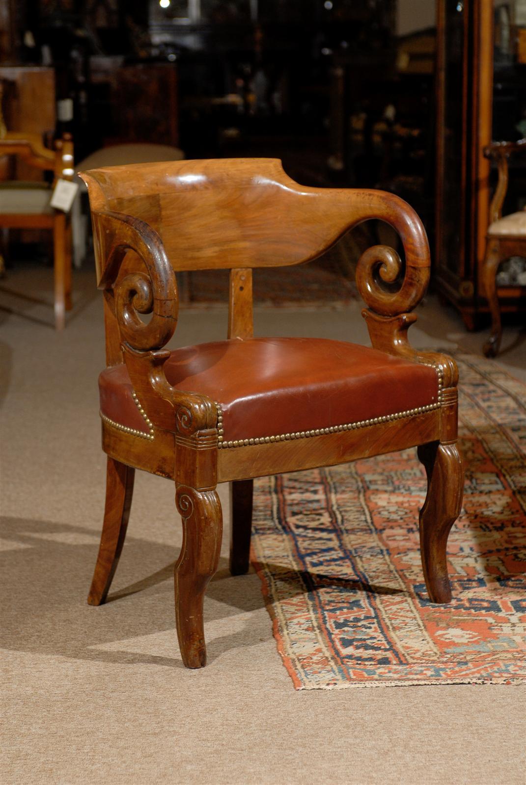 A French Restauration period walnut desk chair with leather set. 

William Word Fine Antiques: Atlanta's source for antique interiors since 1956.