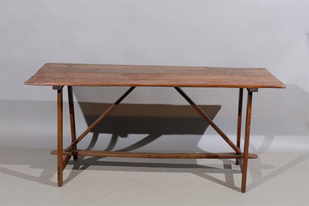 Italian oak trestle table. 

William Word Fine Antiques: Atlanta's source for antique interiors since 1956.
