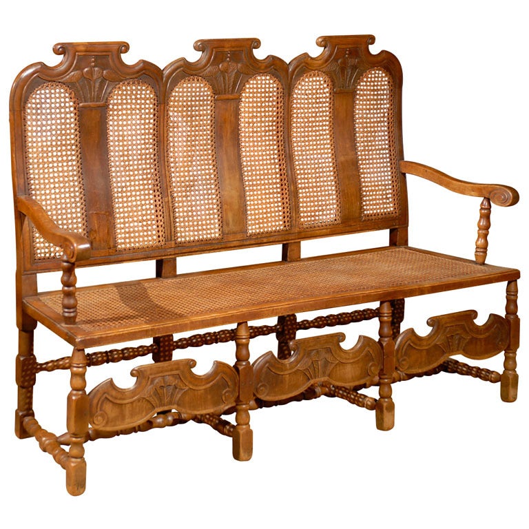Triple back Caned Dutch Bench in Walnut, ca. 1850