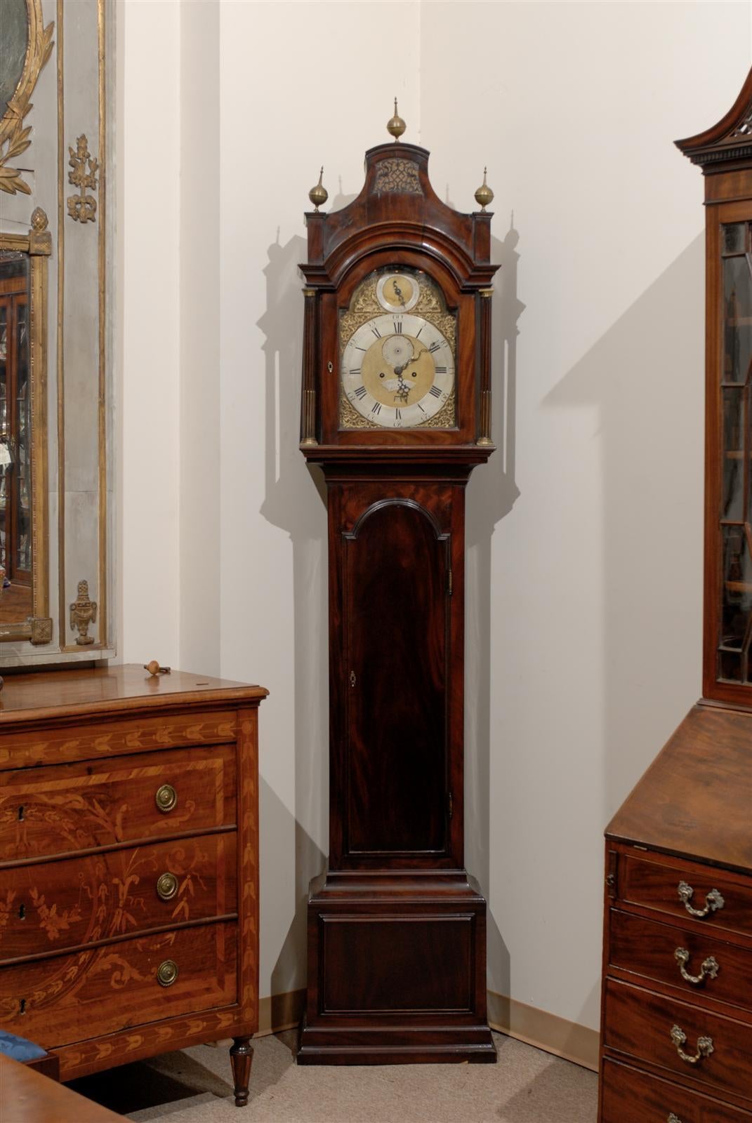 18th century English mahogany tall case clock with brass and steel face, signed "John Boyce, London."