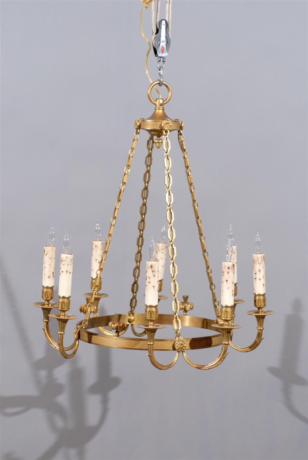 A French neoclassical style round bronze doré six-light chandelier. Recently wired for the U.S.A. 

William Word Fine Antiques: Atlanta's source for antique interiors, since 1956.
