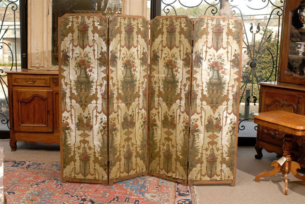 A Four Panel Folding Screen with Painting on Paper and Mounted on Pine Wood  with Chinoiserie and Floral Designs, Dating from the 19th Century and French in Origin.

Each panel is 19.5" W.  Overall width is 78".