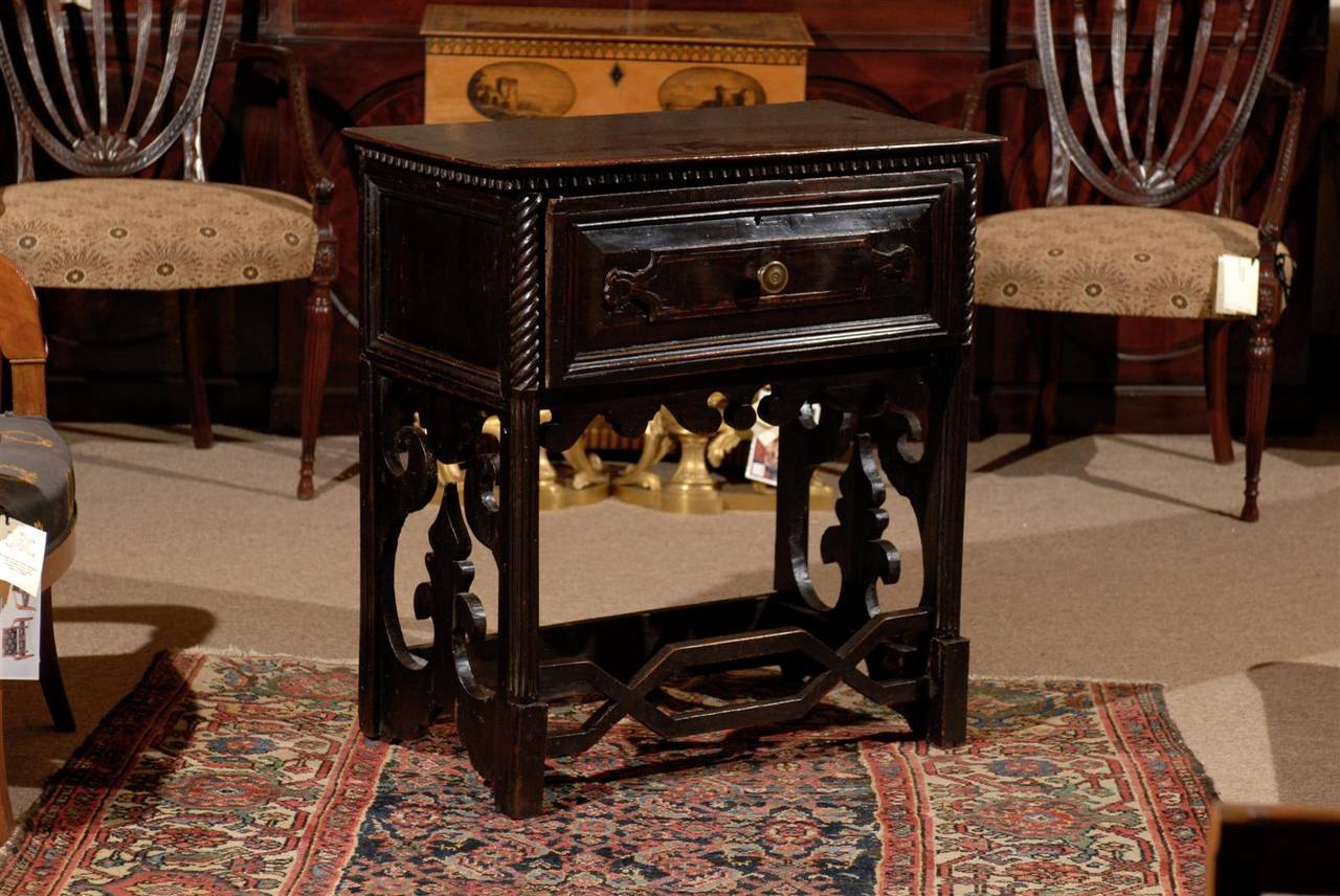 19th century Italian dark walnut console table with drawer and Greek key stretcher. 

William Word Fine Antiques: Atlanta's source for antique interiors since 1956.