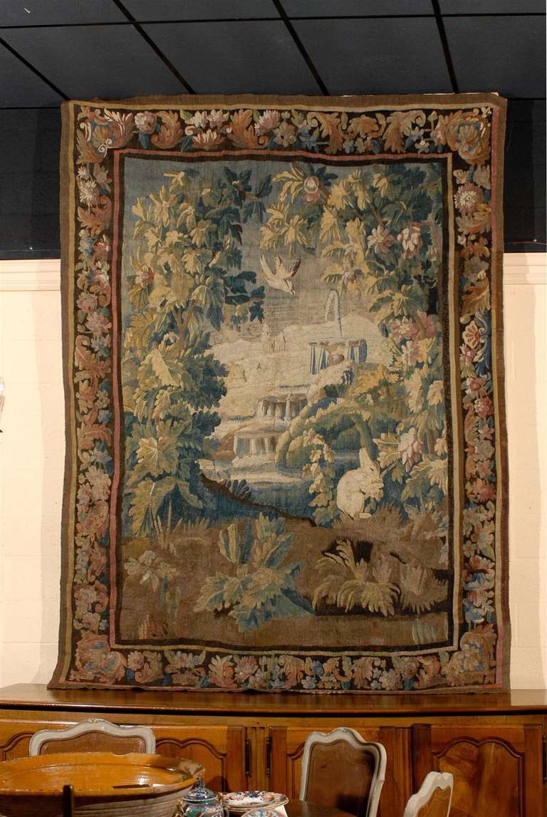 A French Aubusson Tapestry with landscape scene of waterfall and bunny. 

William Word Fine Antiques: Atlanta's source for antique interiors since 1956.
