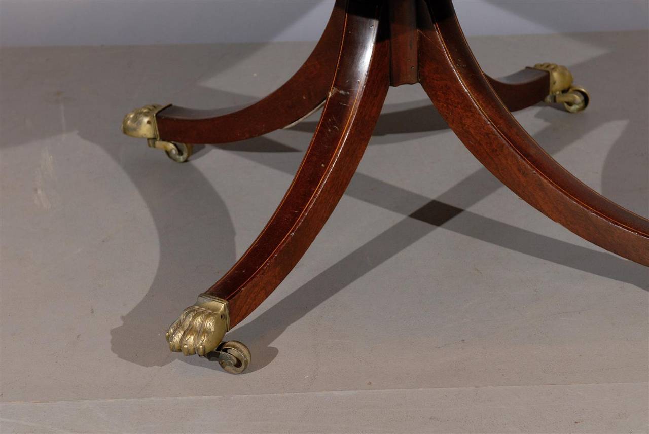 19th Century English Mahogany Rent Table with Inlay and Brass Castors 4