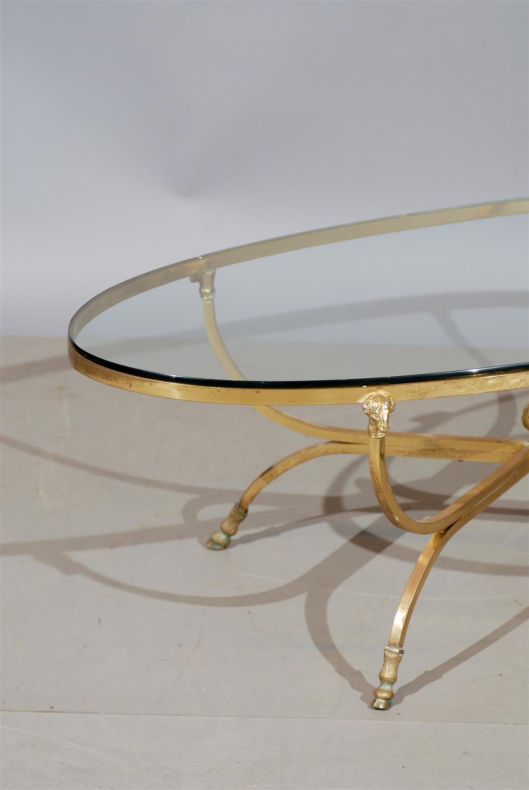 brass and glass coffee table oval