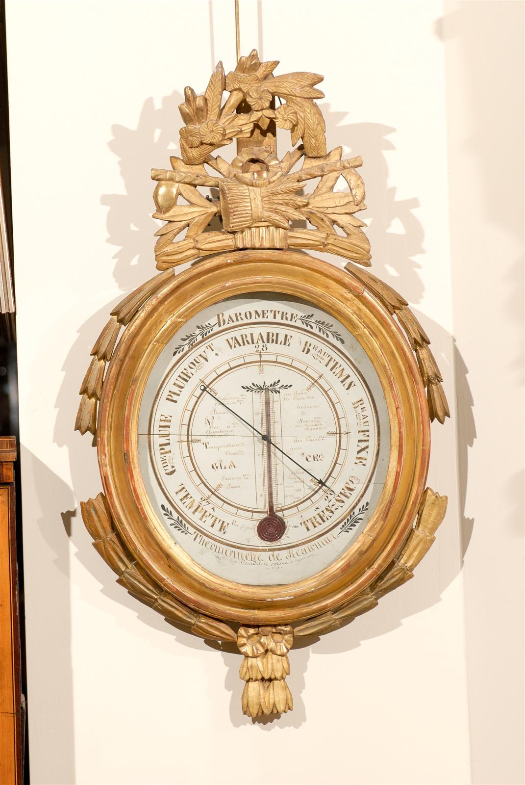 Louis XVI giltwood barometer, France, circa 1790.