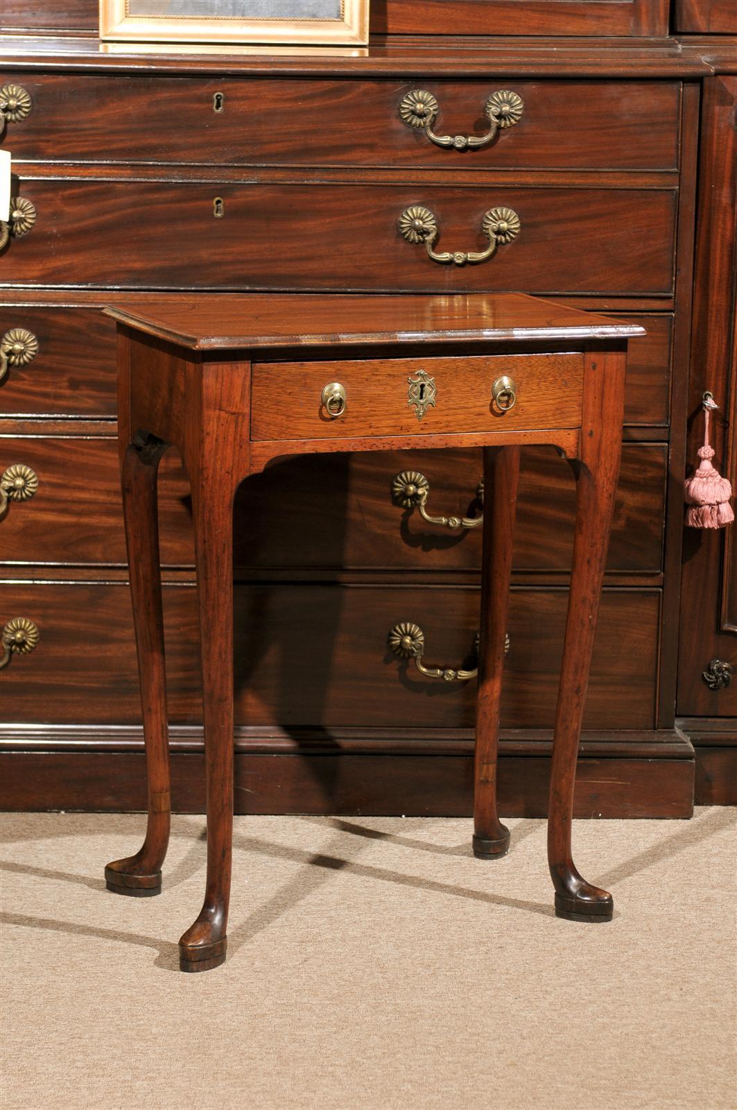 A charming 18th century English Queen Anne table with inlaid top, drawer and cabriole leg with pad foot.

To view our entire inventory, please visit our personal website.

William word fine antiques: Atlanta's source for antique interiors since