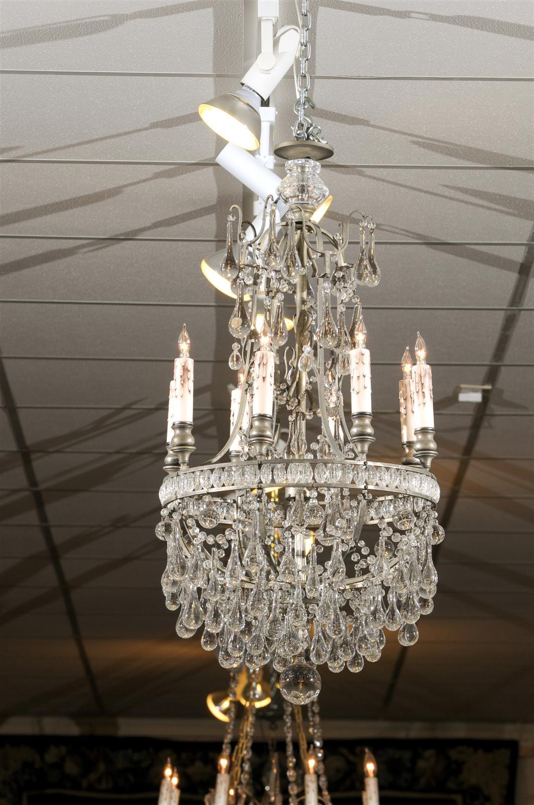 A French crystal and bronze basket shaped chandelier with six lights. 