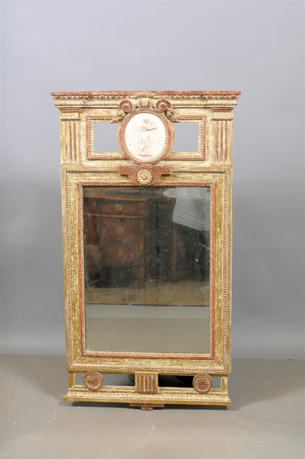 A large giltwood Swedish Mirror with Center Medallion, circa 1790. 

William Word Fine Antiques: Atlanta's source for antique interiors since 1956.