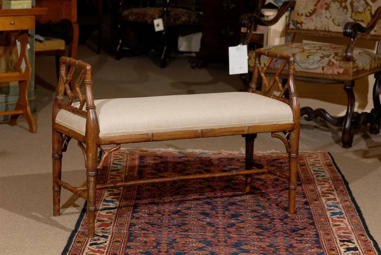 Faux bamboo window bench with linen upholstery. 

William Word Fine Antiques: Atlanta's source for antique interiors since 1956.