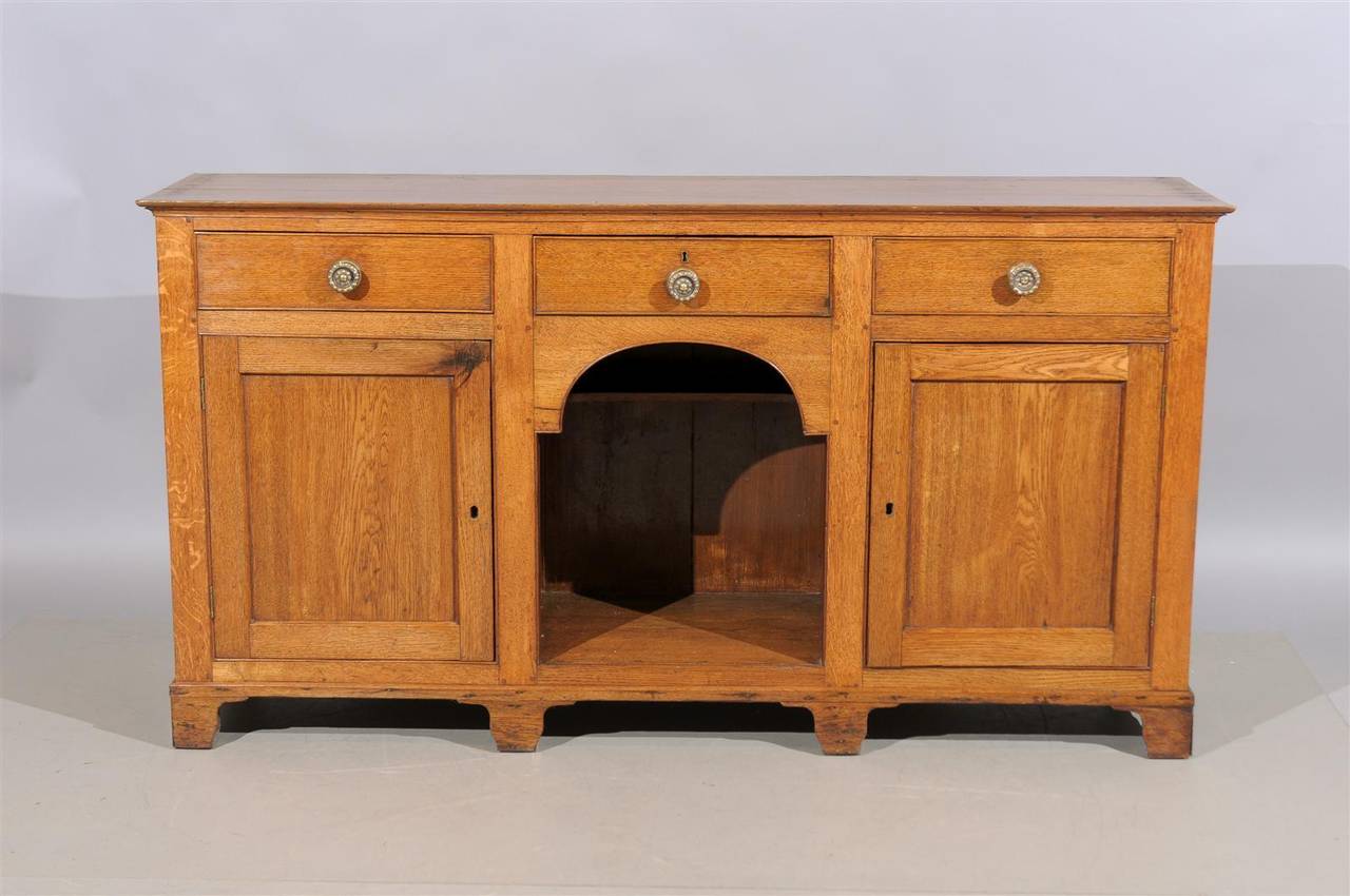 19th century English oak dresser base/server with two doors, three drawers and Cubby Hole with shelf.

To view our entire inventory, please visit our personal website.

William word fine antiques: Atlanta's source for antique interiors since,